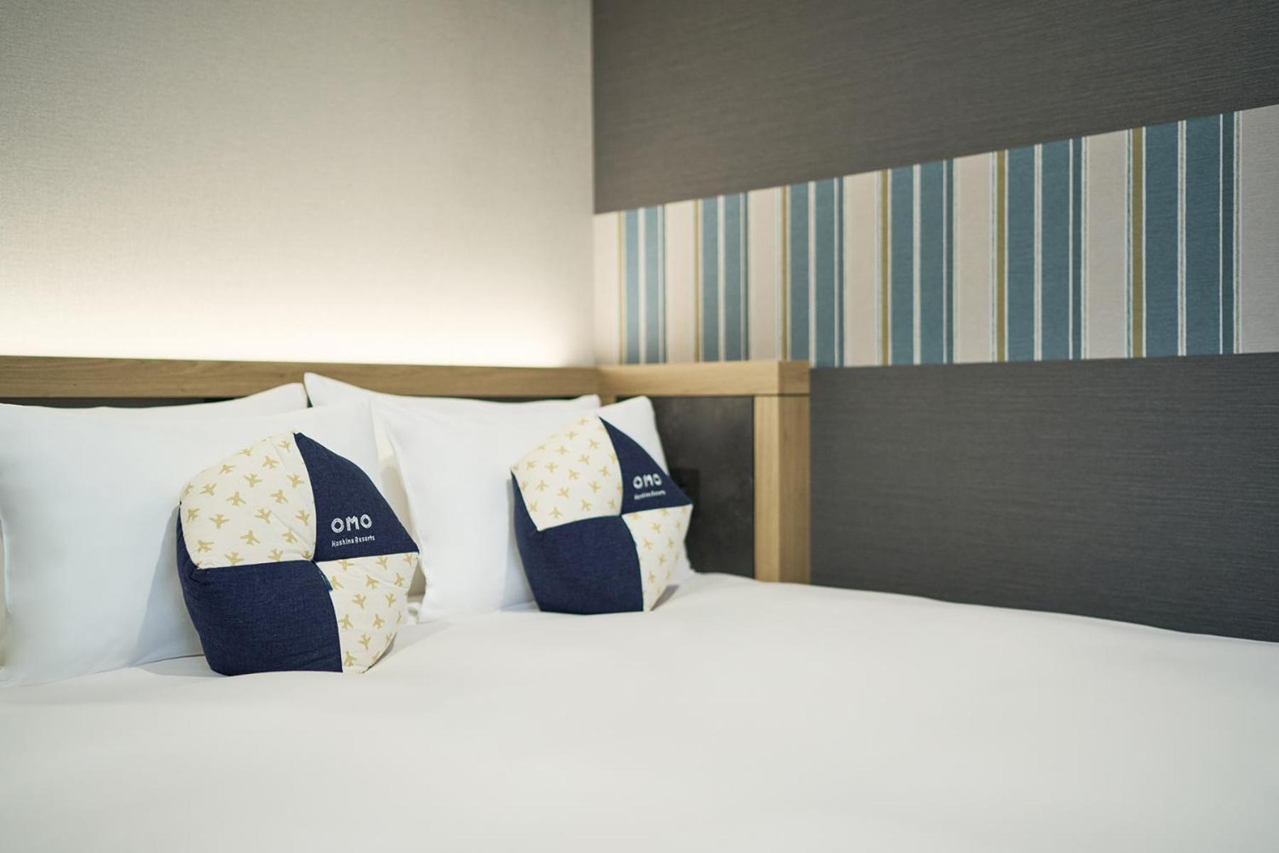 Omo Kansai Airport By Hoshino Resorts Izumisano Esterno foto A bed at a hotel